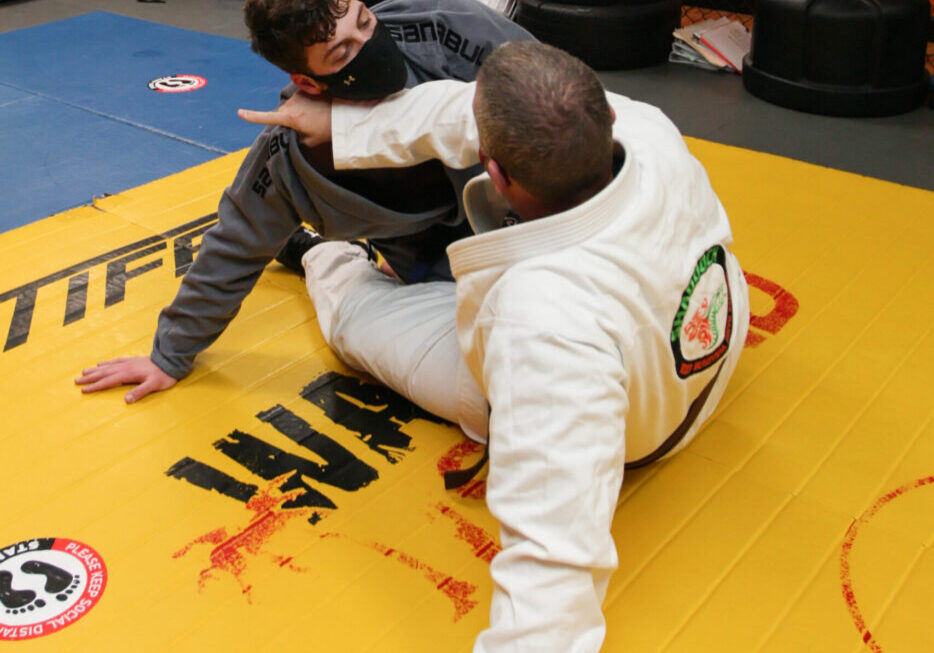 two men in traditional jiu jitsu class
