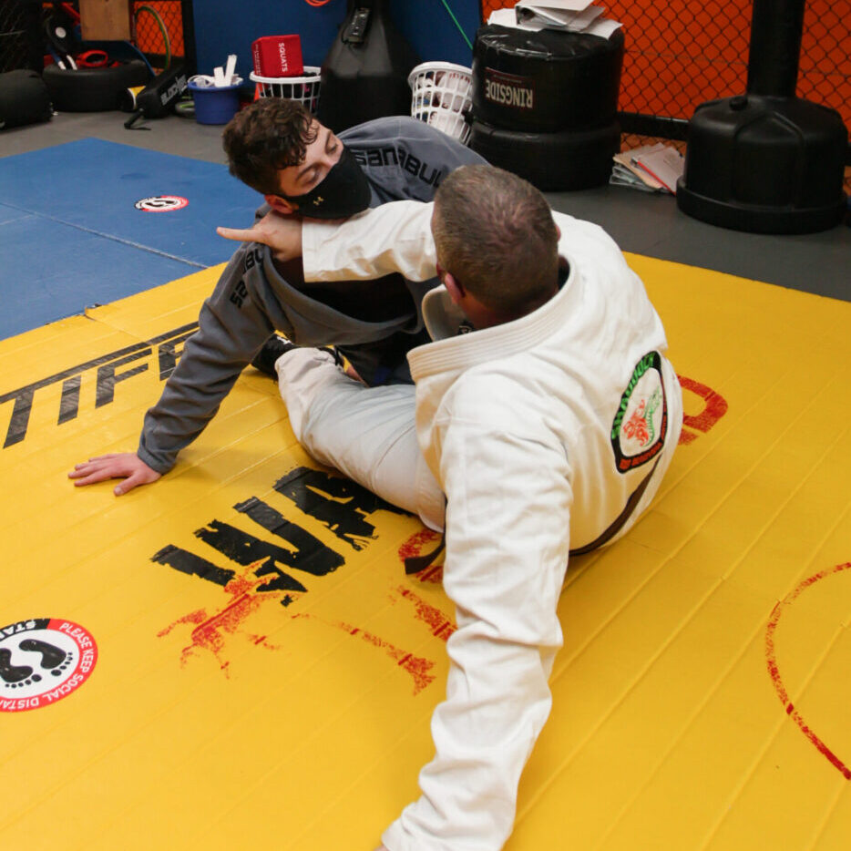 two men in traditional jiu jitsu class